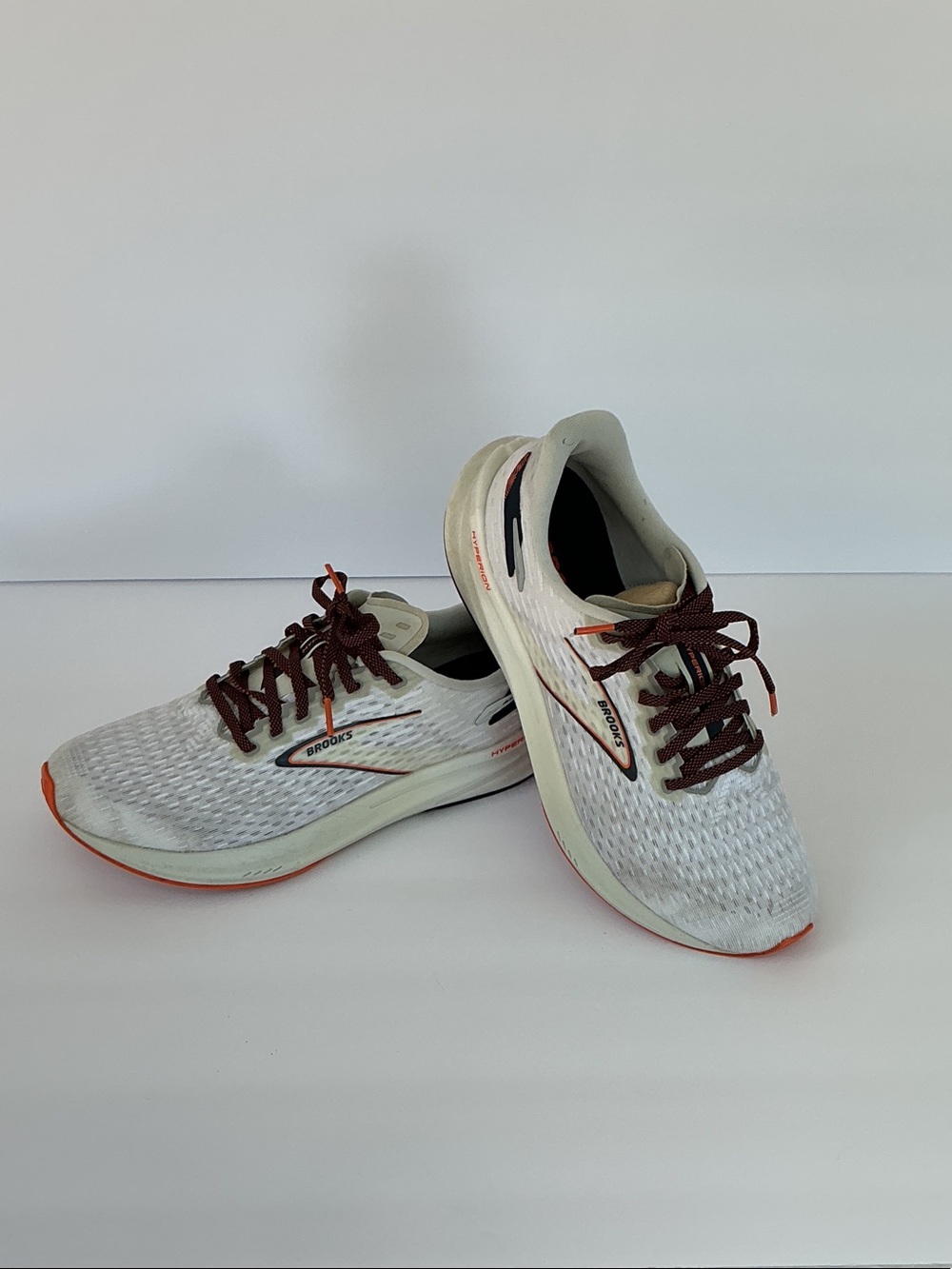 Brooks Men's White Running Shoes with Orange and Burgundy Details